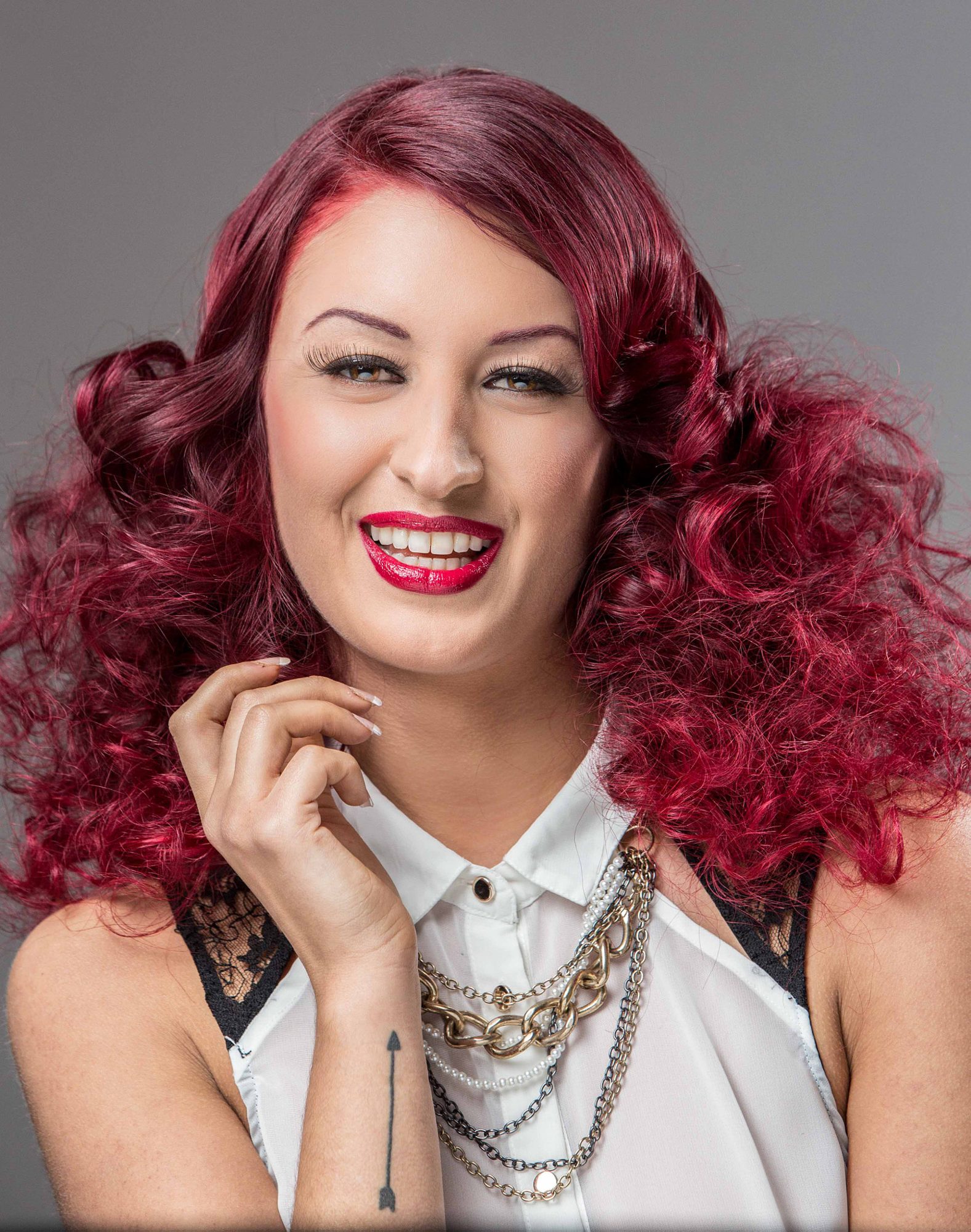 Portrait with voluminous red curls