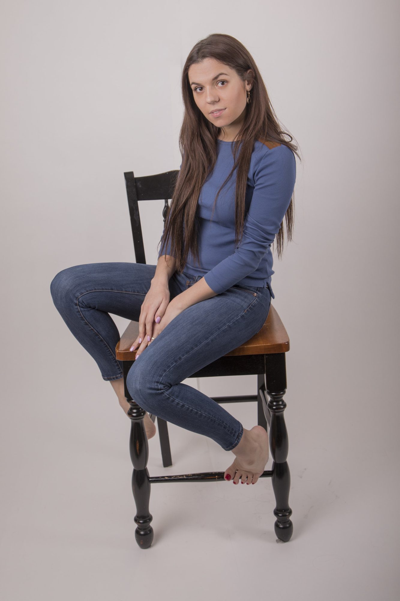 Seated portrait in denim
