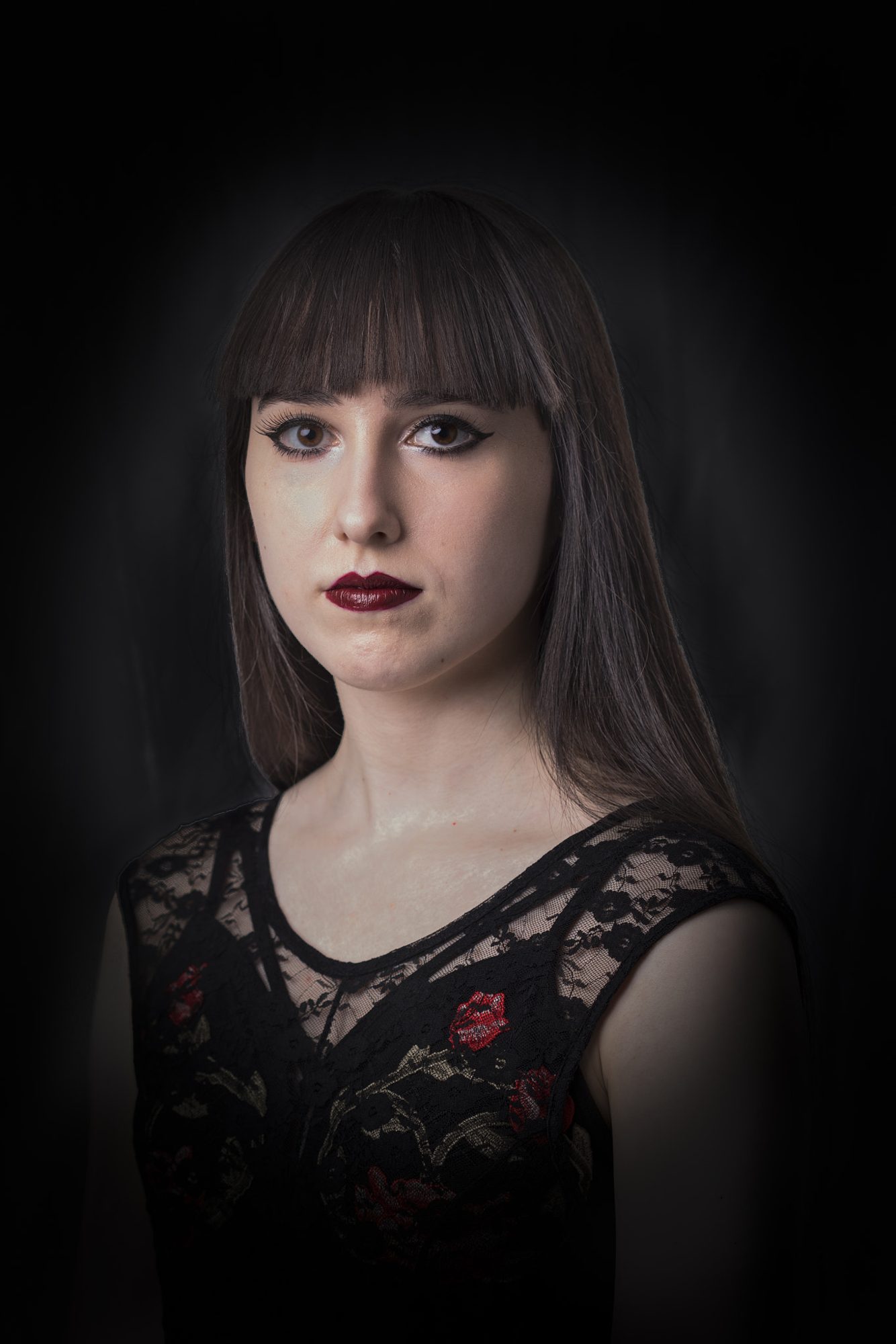Low-key portrait in lace